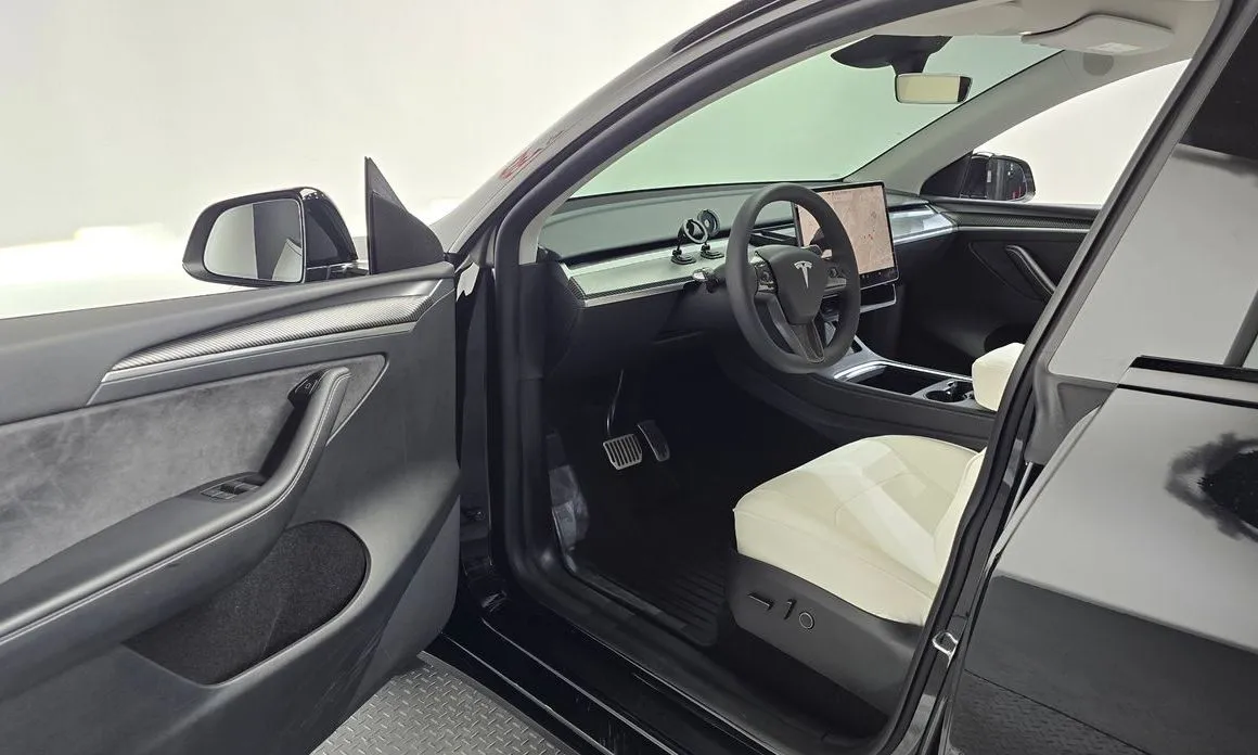 Tesla Model Y — фото 9