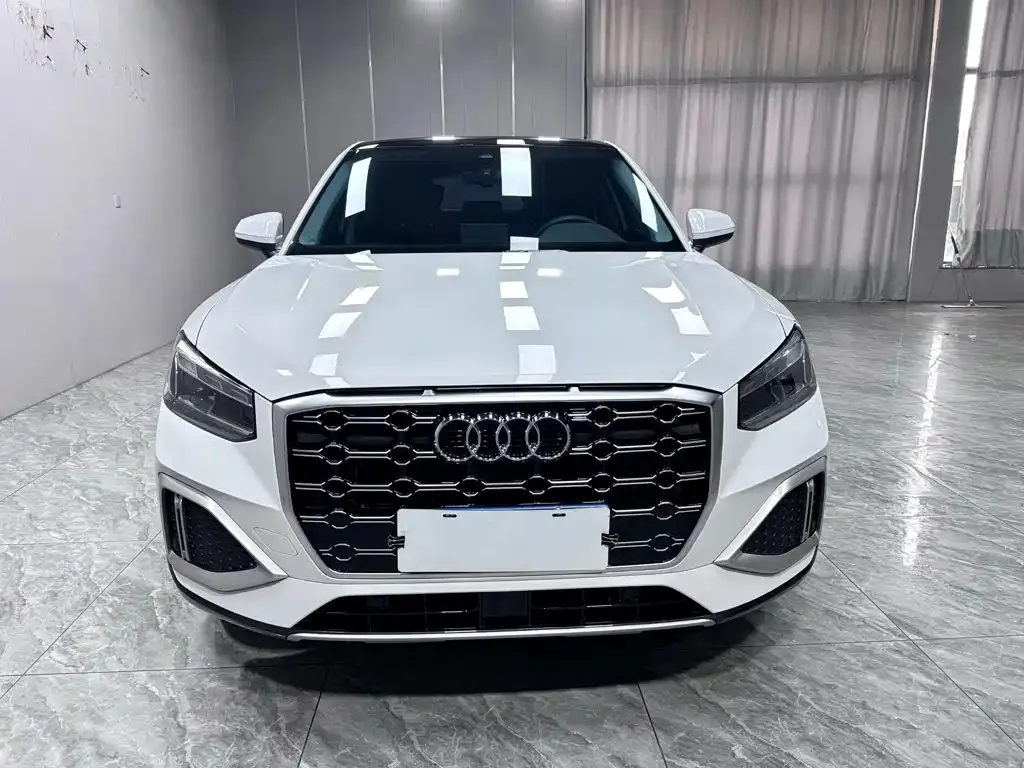Audi Q2L — фото 10