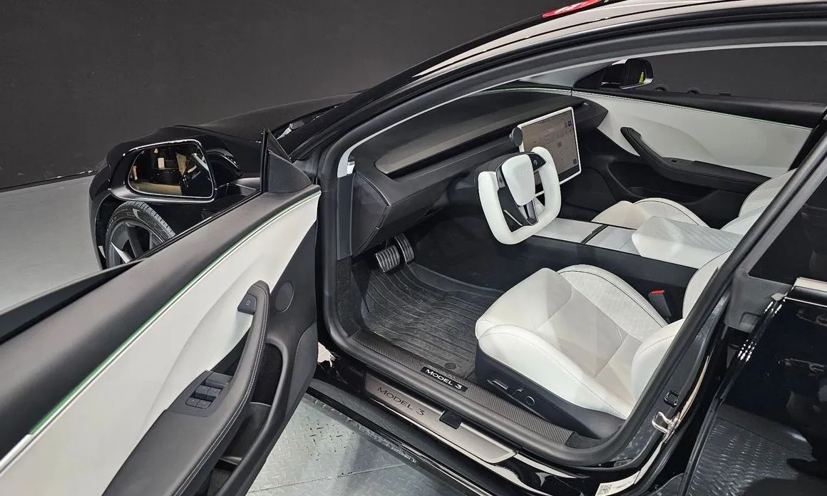 Tesla Model 3 — фото 7