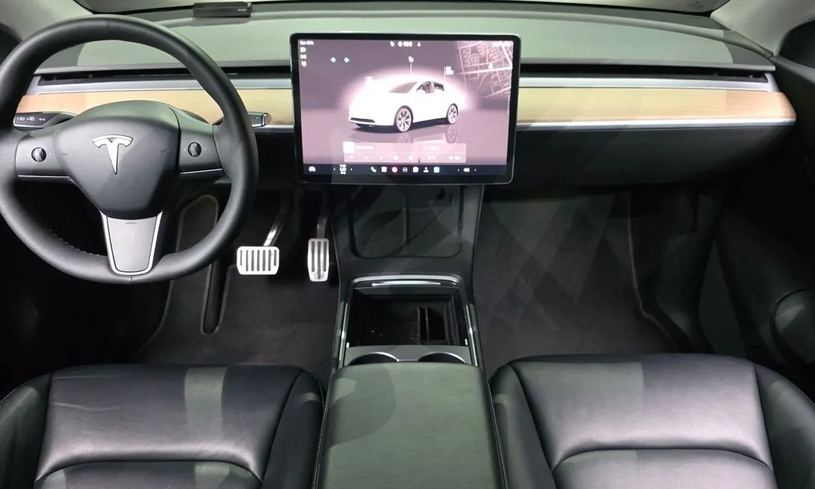 Tesla Model Y — фото 7
