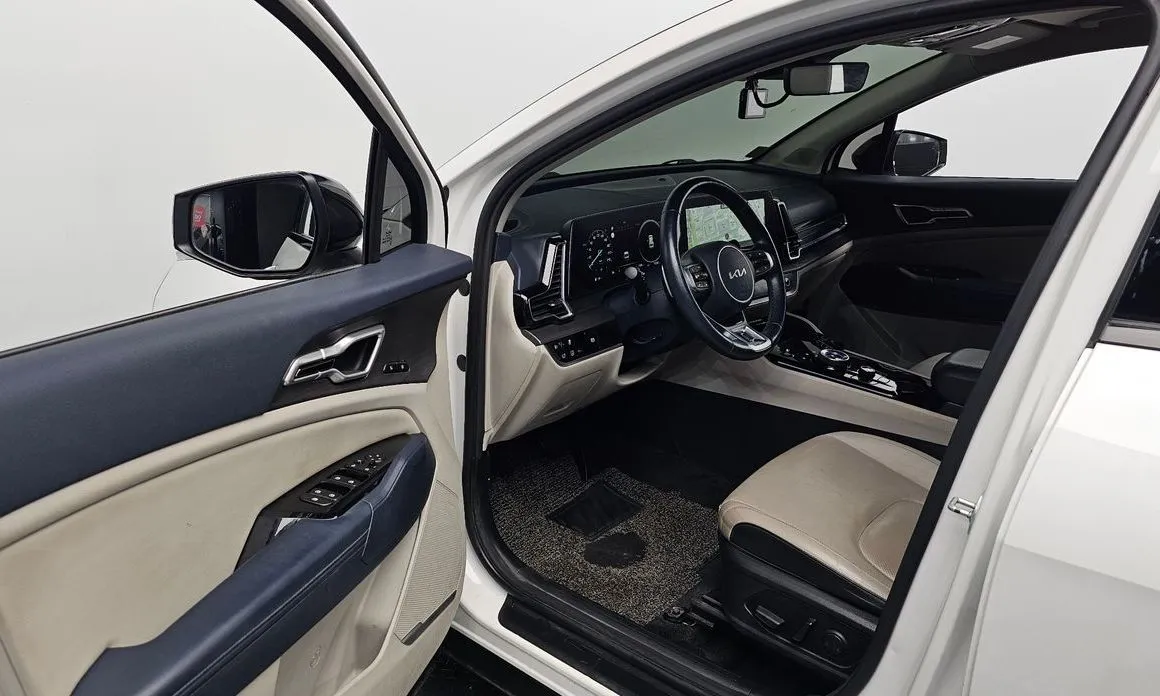 Kia Sportage — фото 7