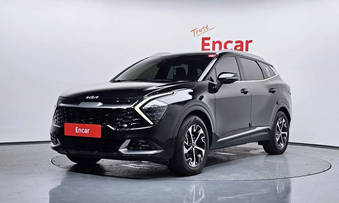 Kia Sportage — фото 1