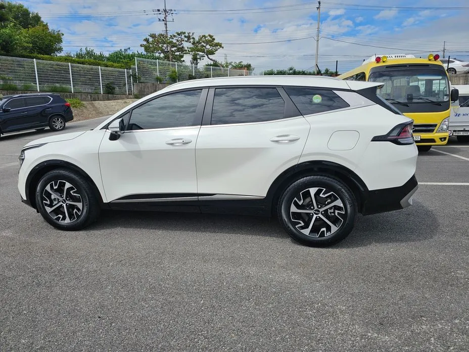 Kia Sportage — фото 5