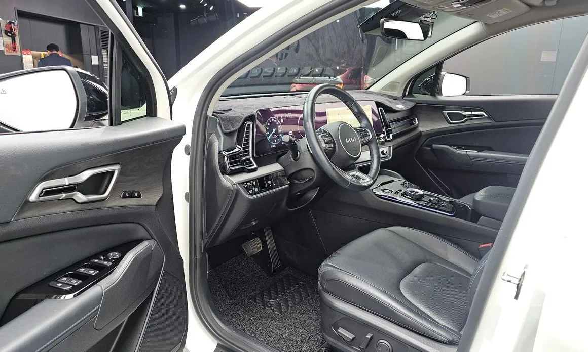 Kia Sportage — фото 7