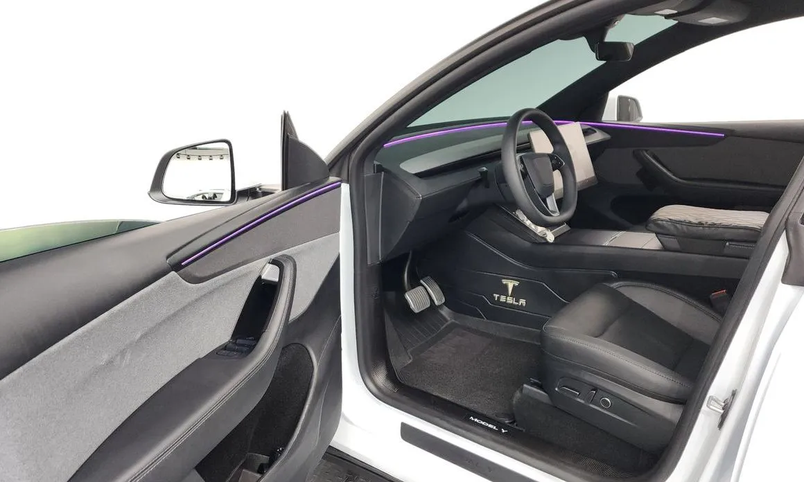 Tesla Model Y — фото 8