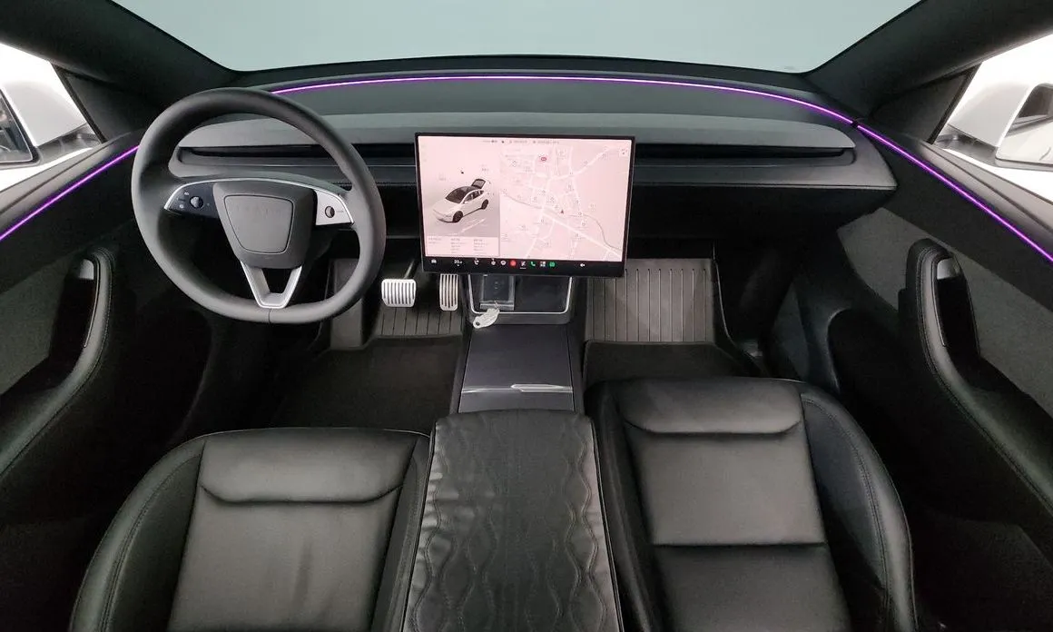 Tesla Model Y — фото 9