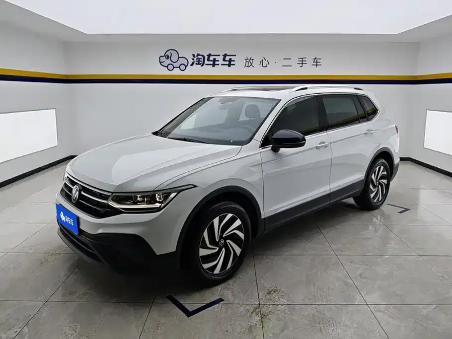 Volkswagen Tiguan L — фото 1