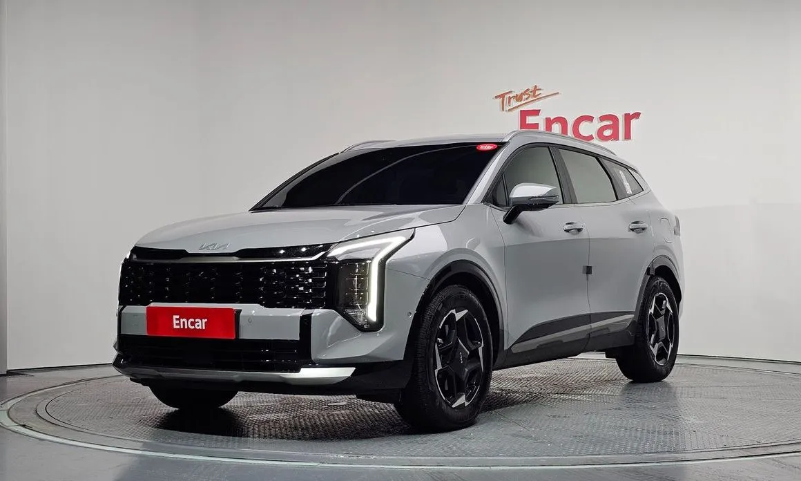 Kia Sportage — фото 1
