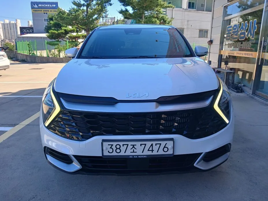 Kia Sportage — фото 1