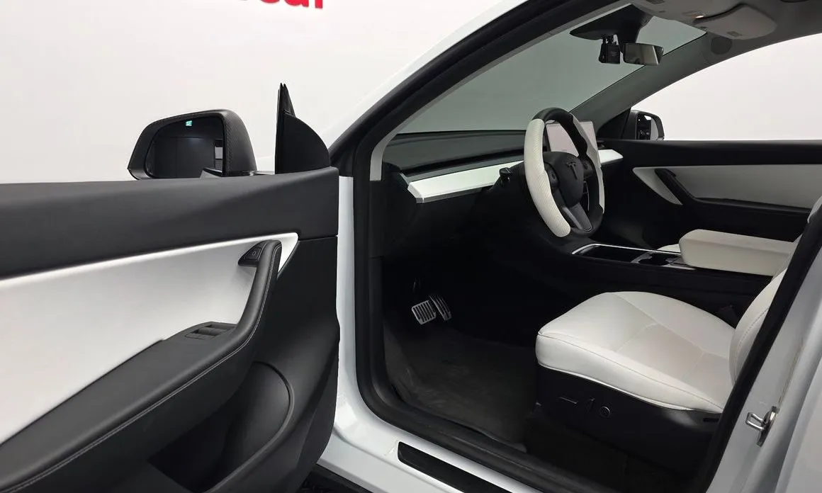 Tesla Model Y — фото 6