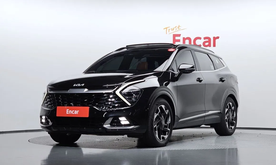 Kia Sportage — фото 1