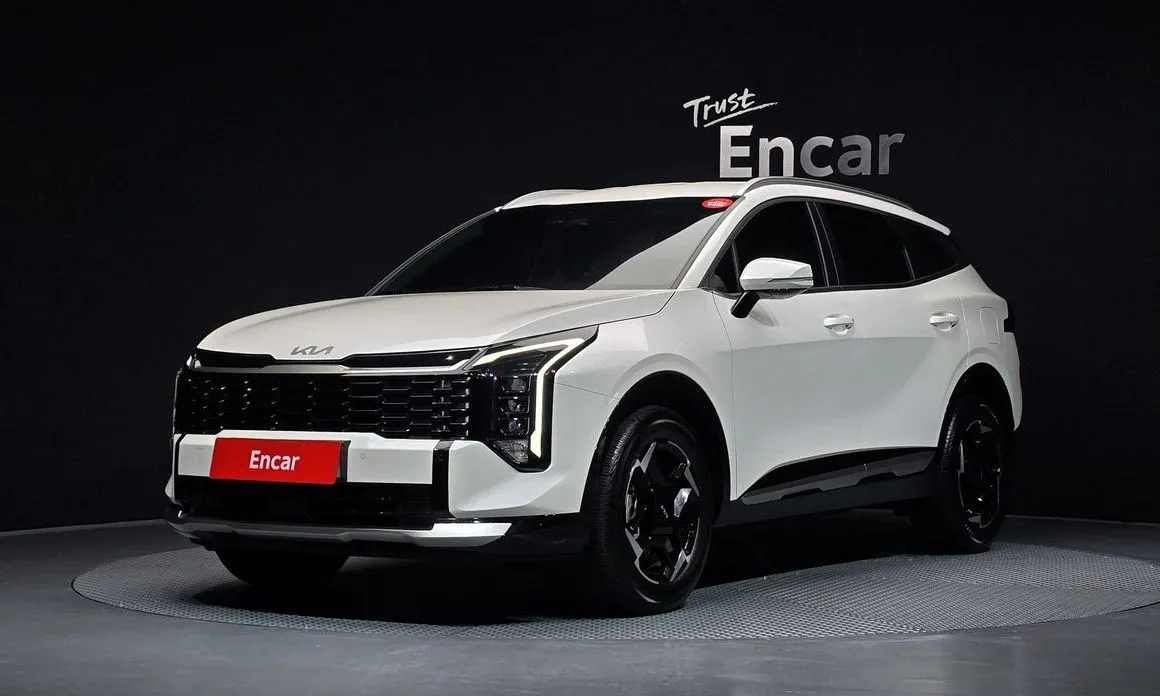 Kia Sportage — фото 1