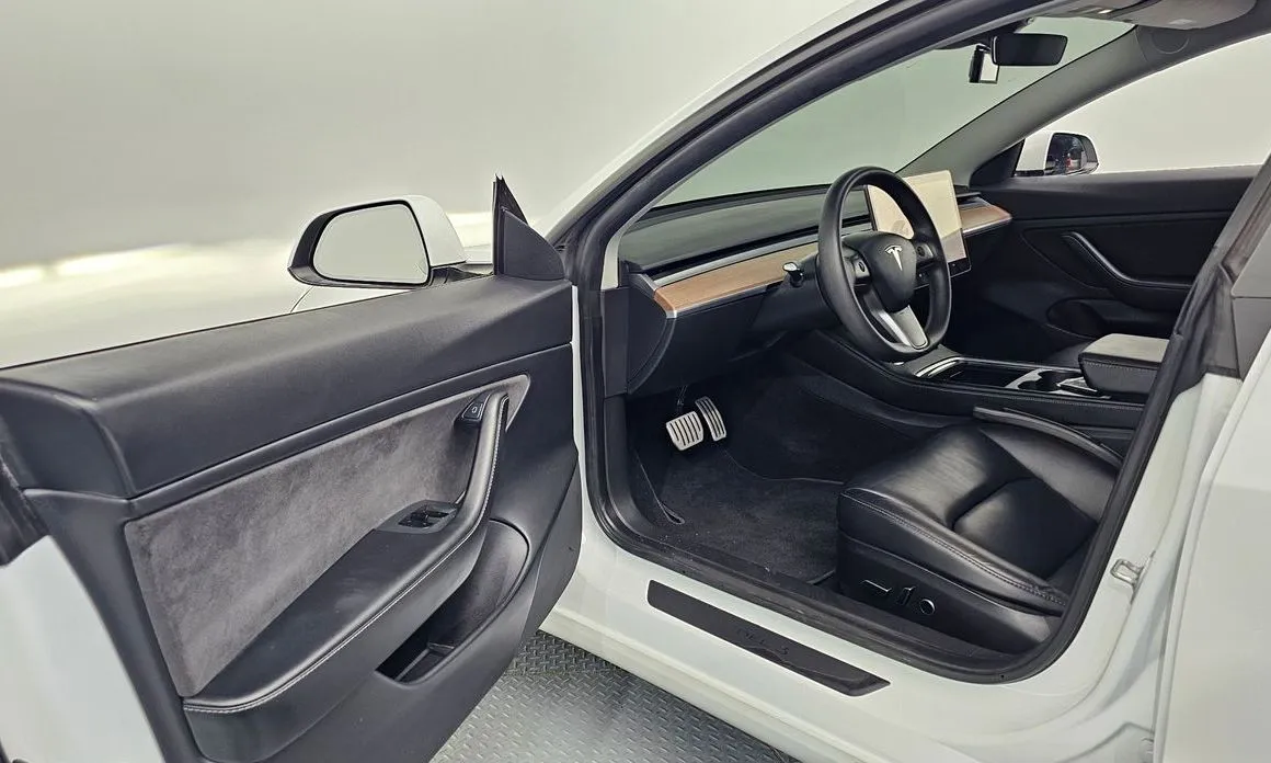 Tesla Model 3 — фото 6
