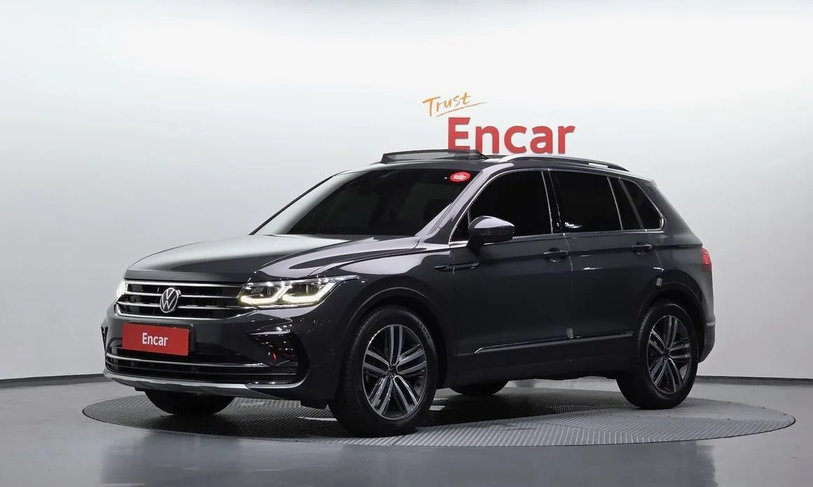 Volkswagen Tiguan — фото 1