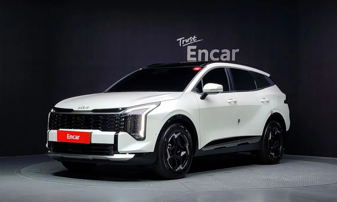 Kia Sportage — фото 1