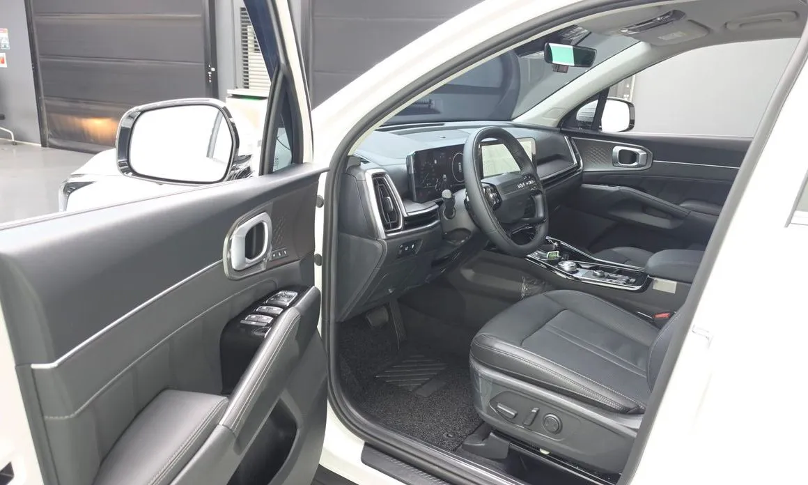 Kia Sorento — фото 7