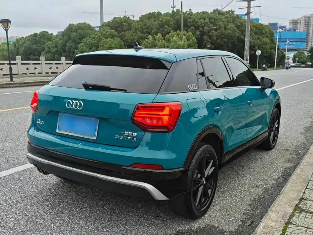 Audi Q2L — фото 5