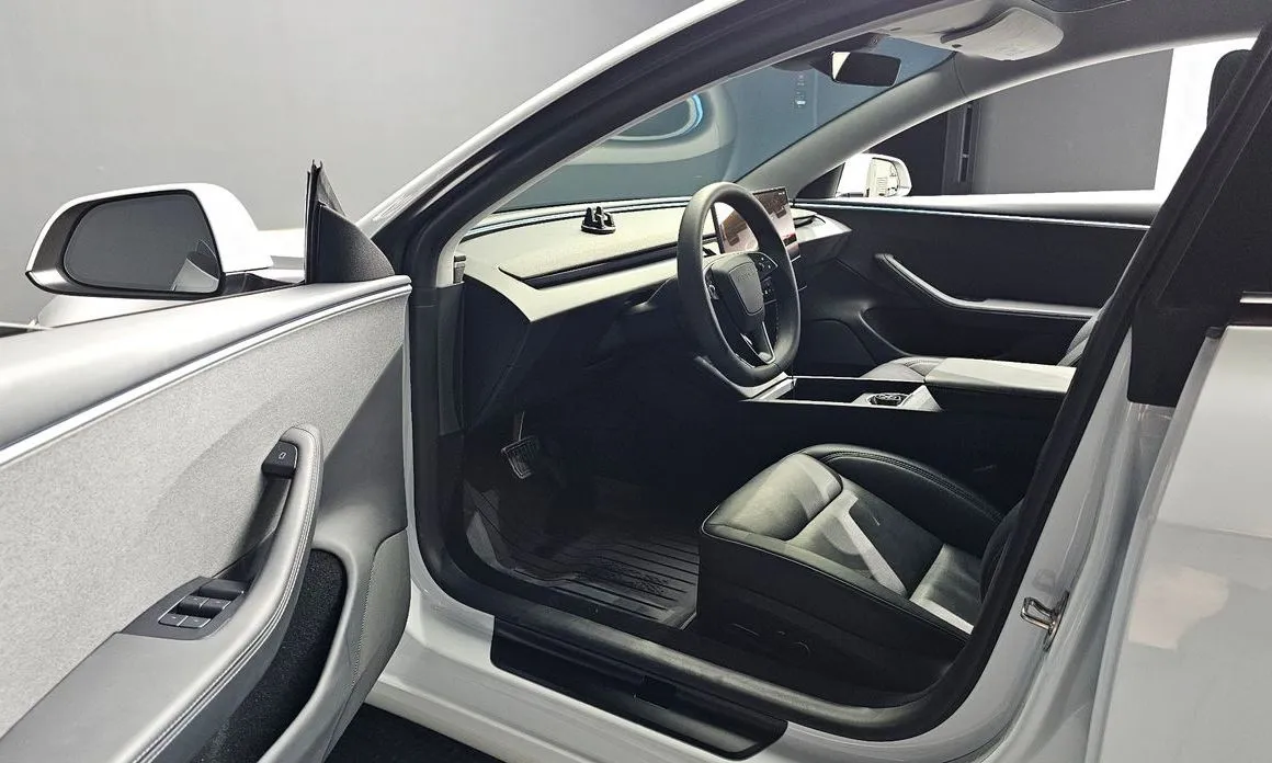 Tesla Model 3 — фото 9