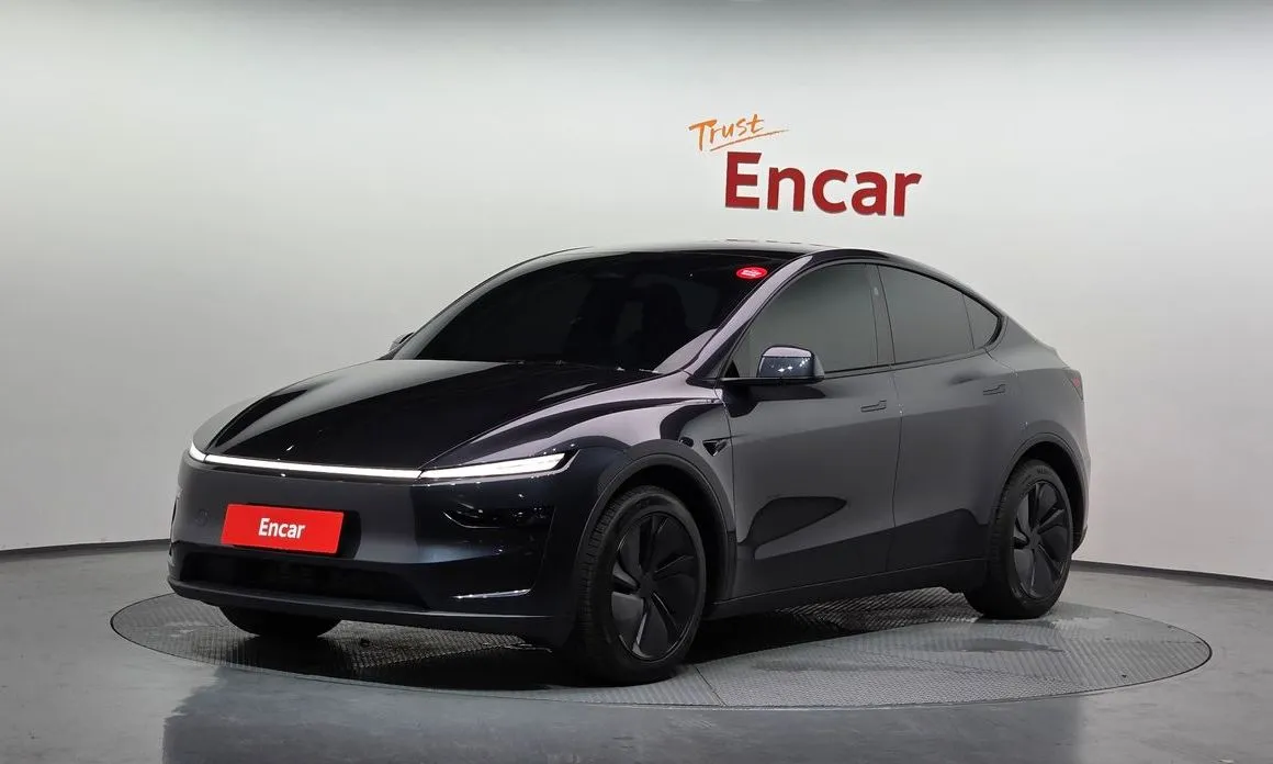 Tesla Model Y — фото 1