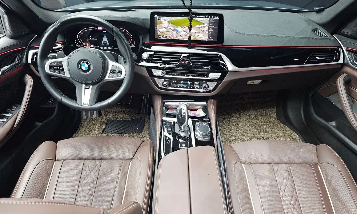 BMW 5-Series — фото 10