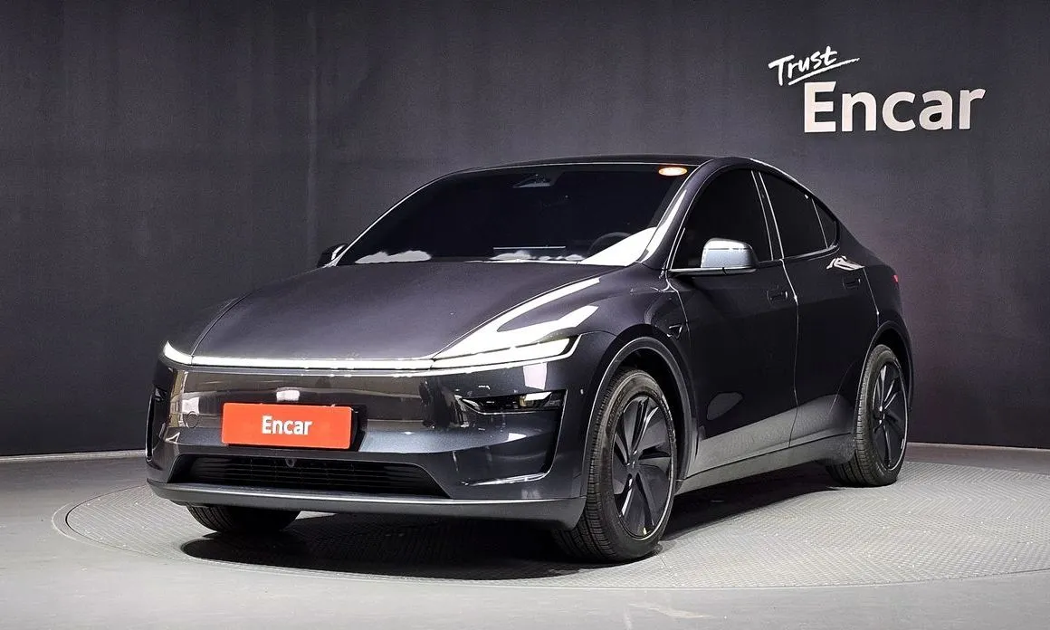 Tesla Model Y — фото 1