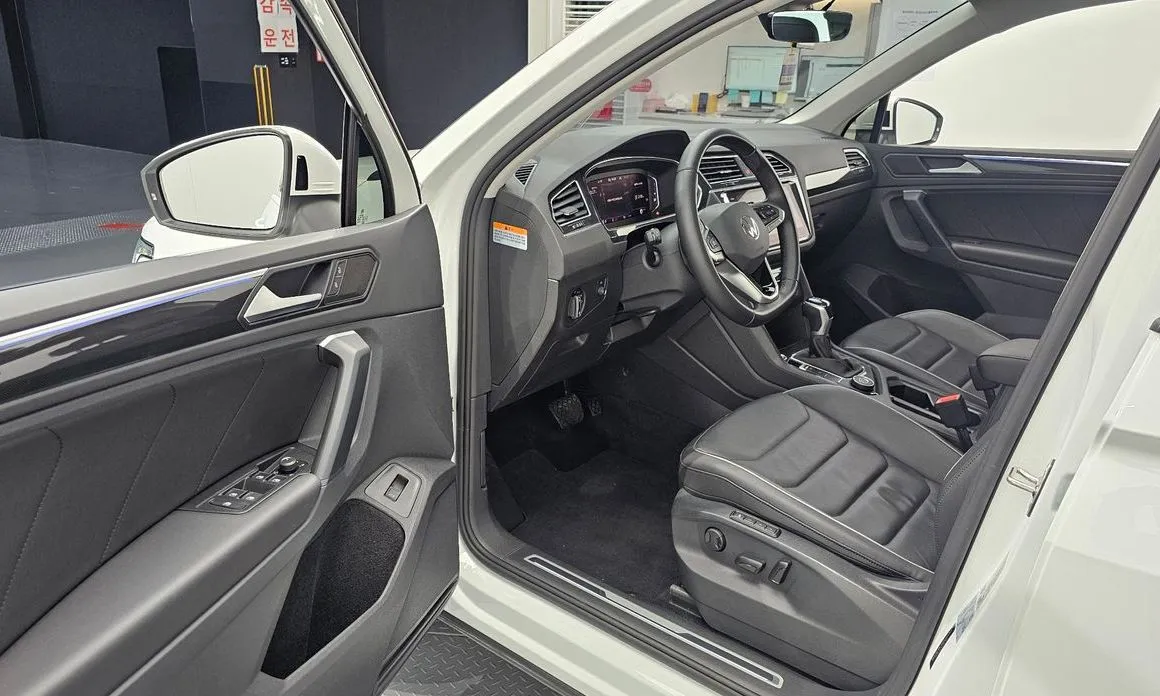Volkswagen Tiguan — фото 7