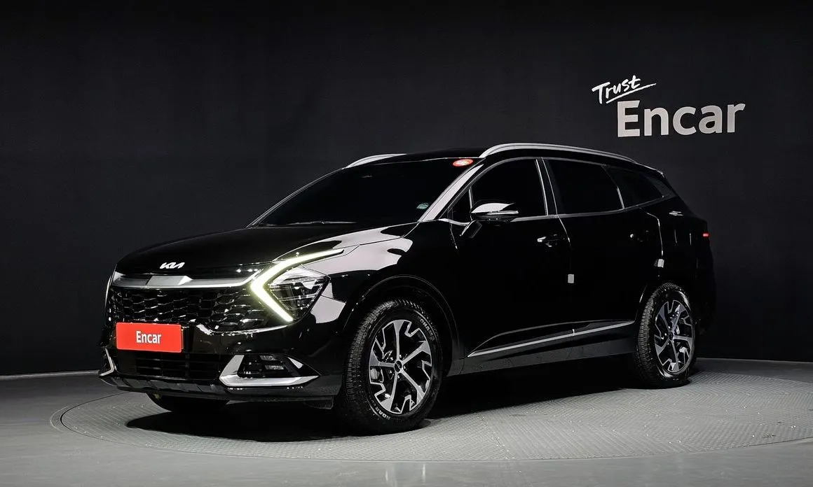 Kia Sportage — фото 1