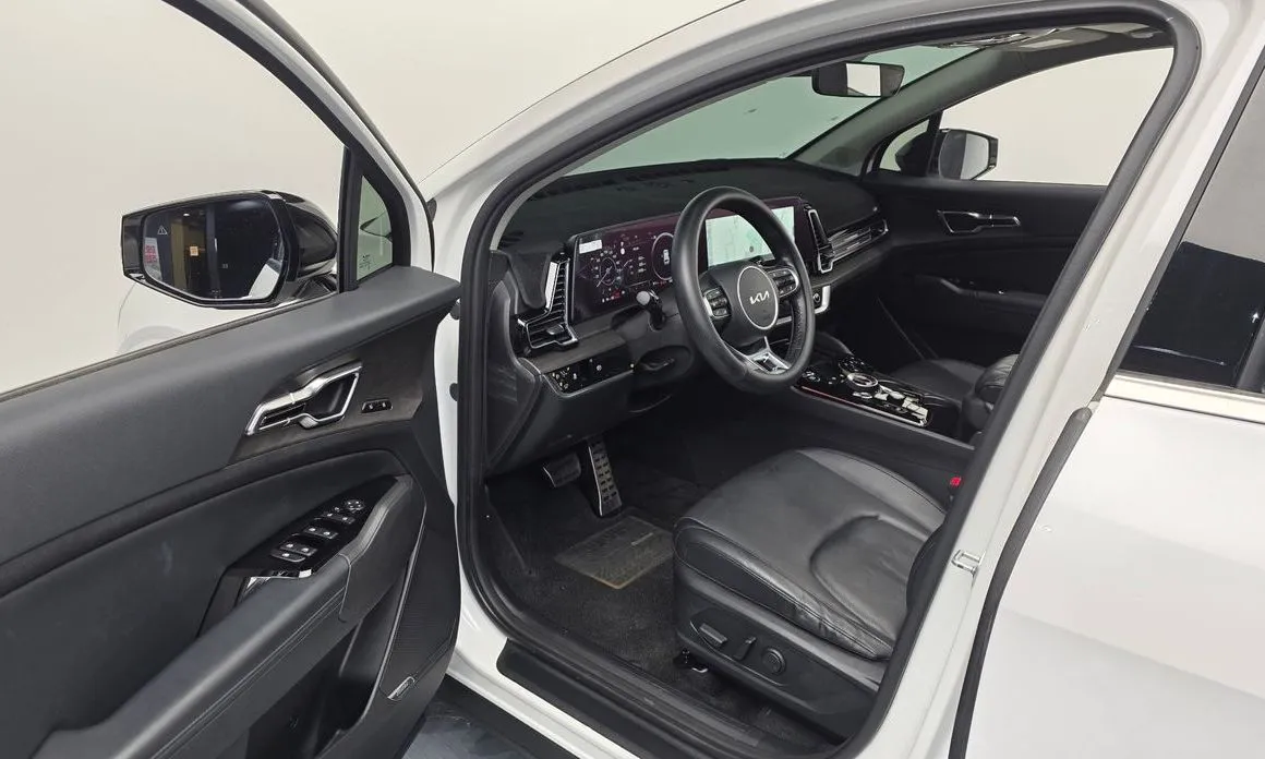 Kia Sportage — фото 10