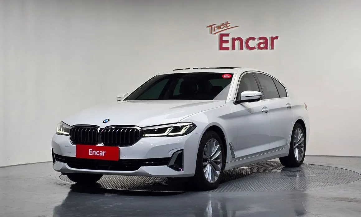 BMW 5-Series — фото 1