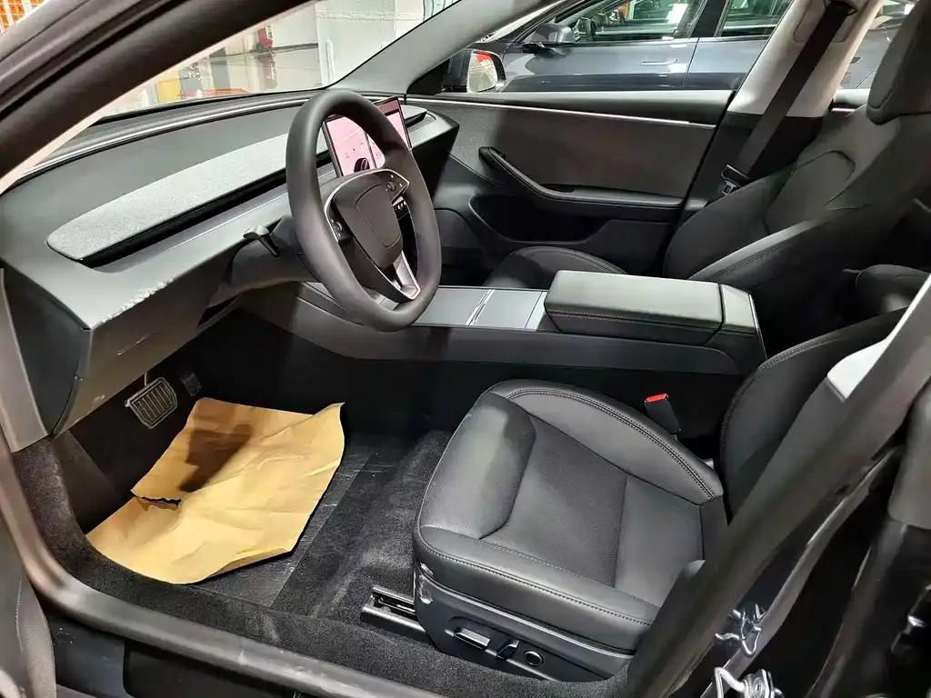 Tesla Model 3 — фото 9