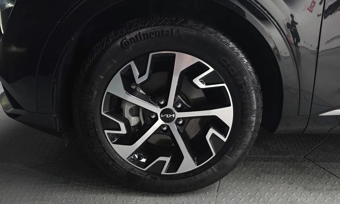 Kia Sportage — фото 10