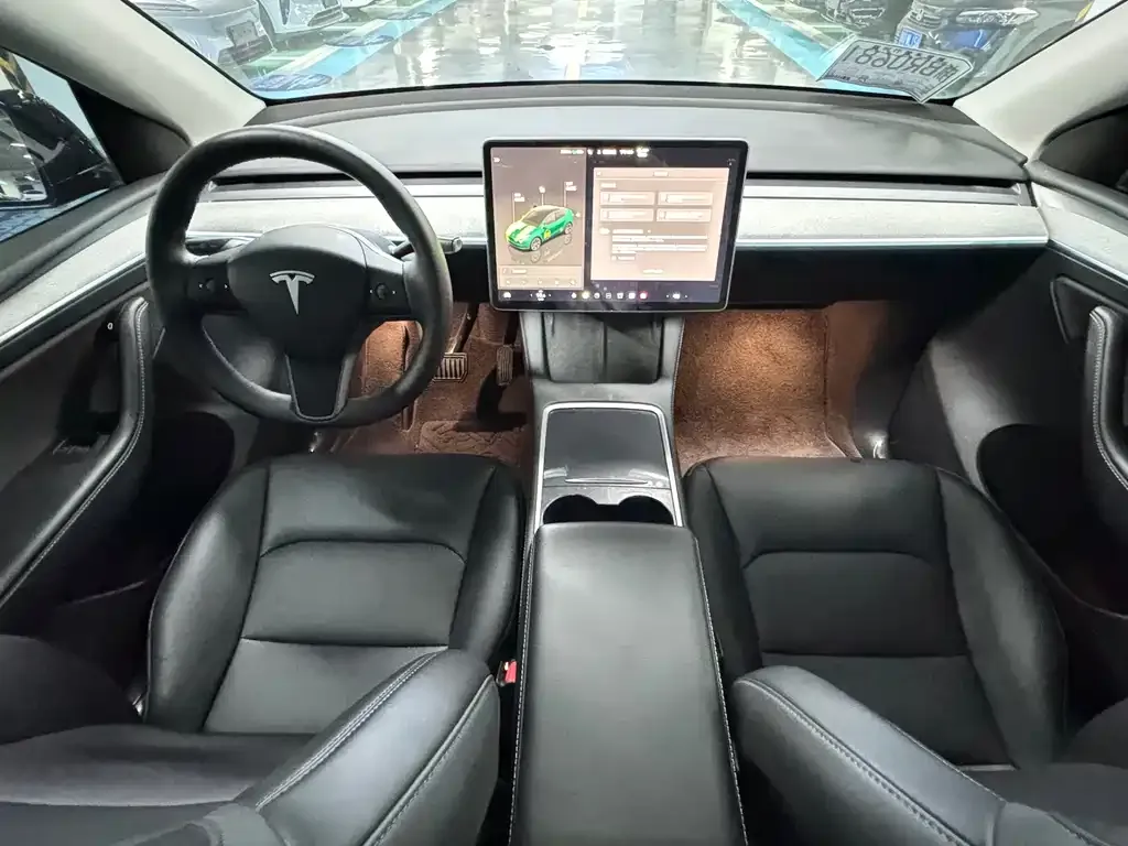 Tesla Model Y — фото 9