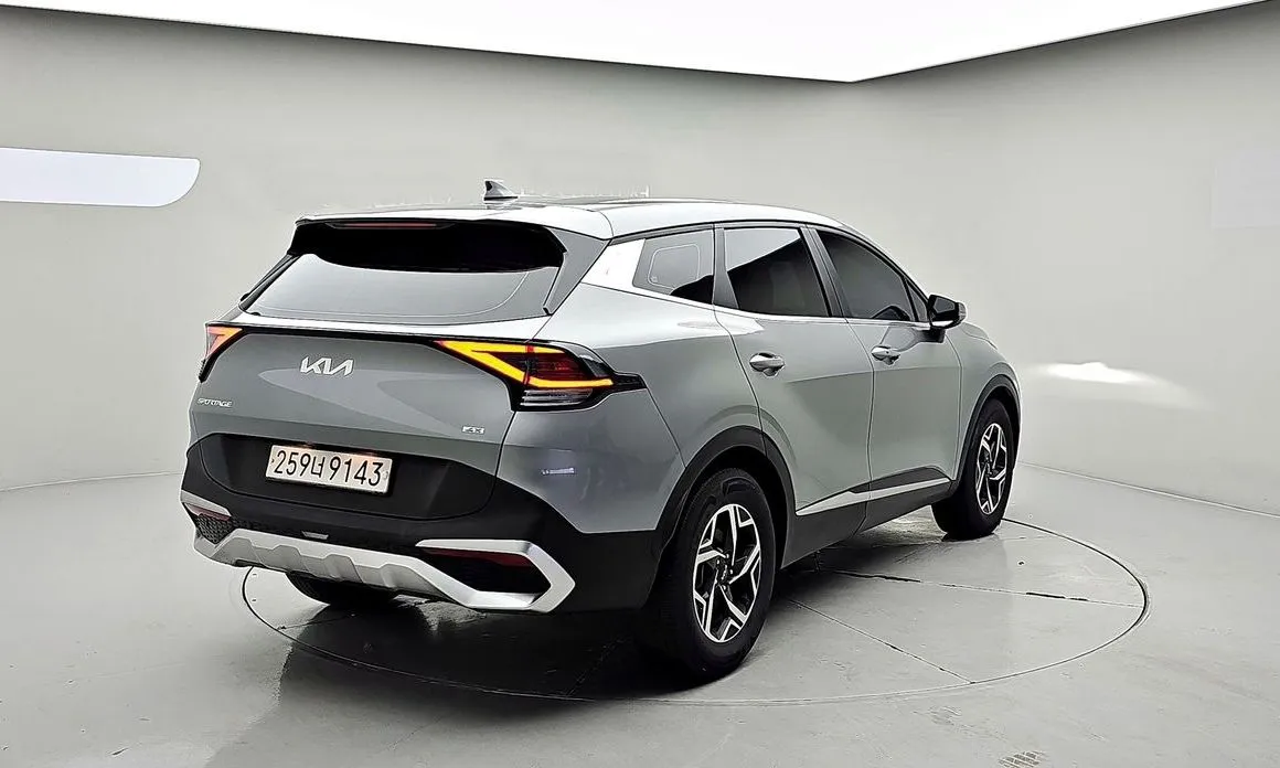 Kia Sportage — фото 10
