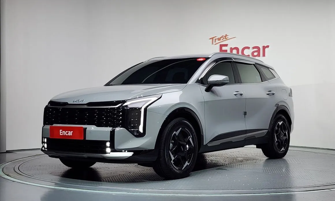 Kia Sportage — фото 1
