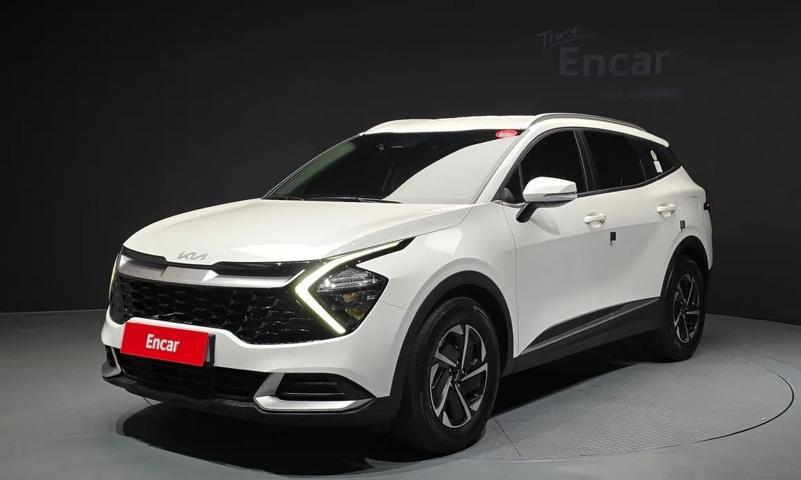 Kia Sportage — фото 1