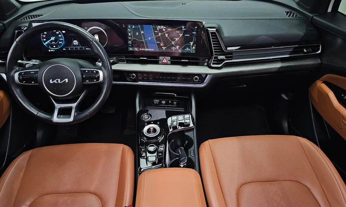 Kia Sportage — фото 10