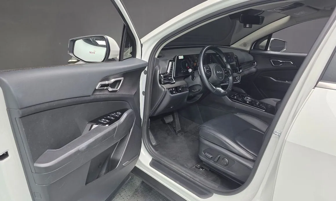 Kia Sportage — фото 10