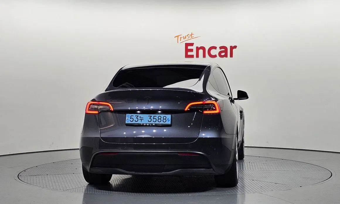 Tesla Model Y — фото 7