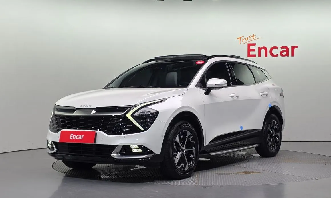 Kia Sportage — фото 1