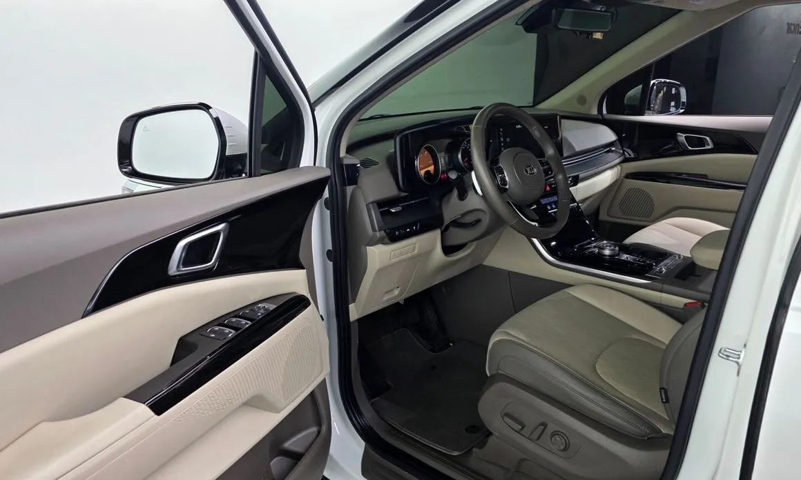 Kia Carnival — фото 7