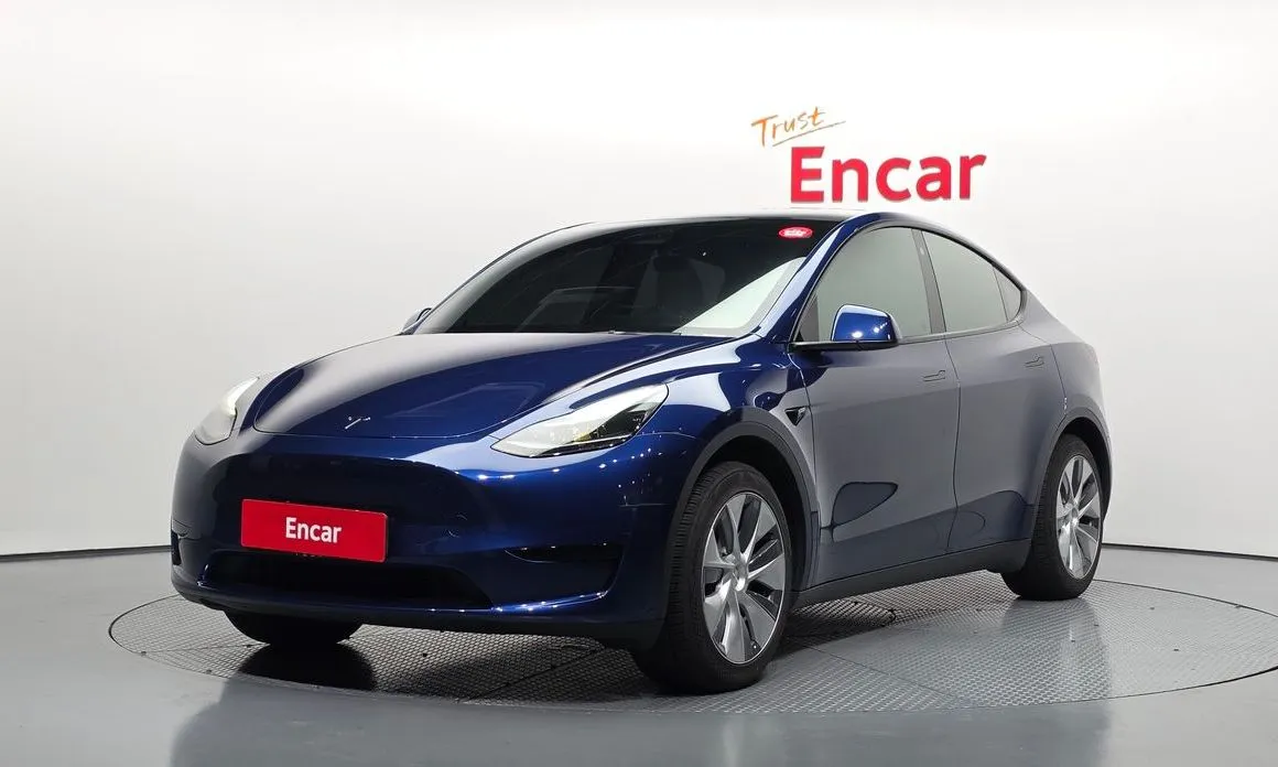 Tesla Model Y — фото 1