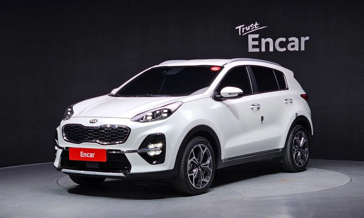 Kia Sportage — фото 1