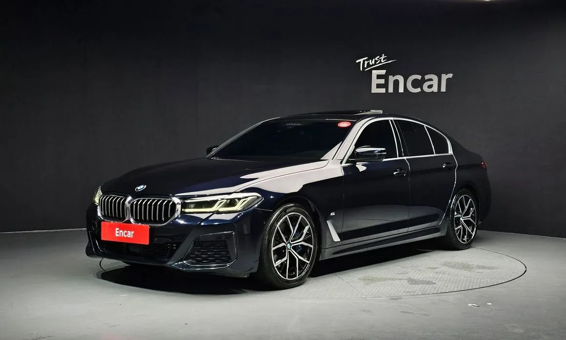 BMW 5-Series — фото 1
