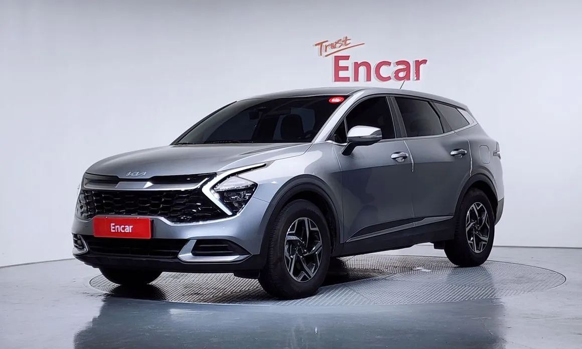 Kia Sportage — фото 1