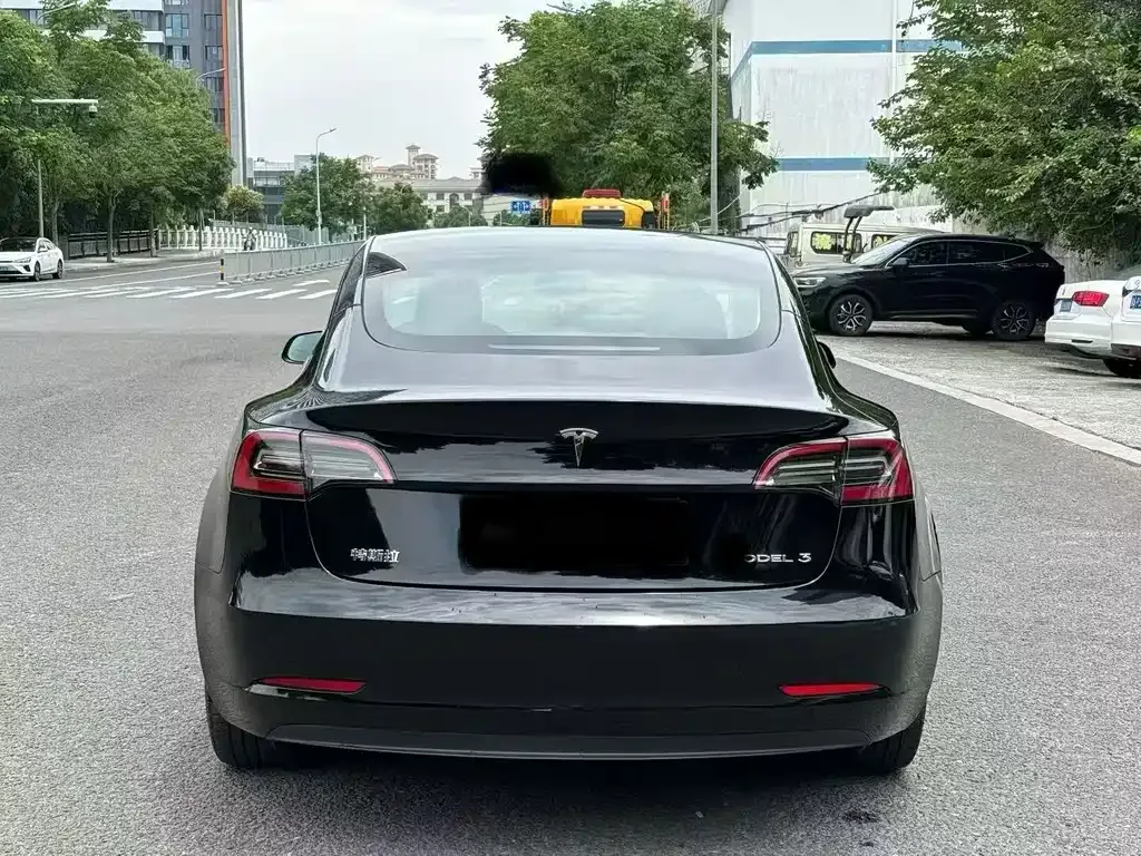 Tesla Model 3 — фото 7