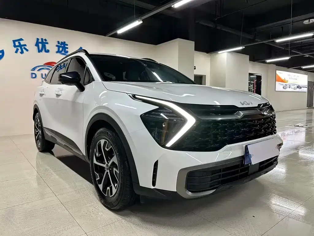 Kia Sportage — фото 10