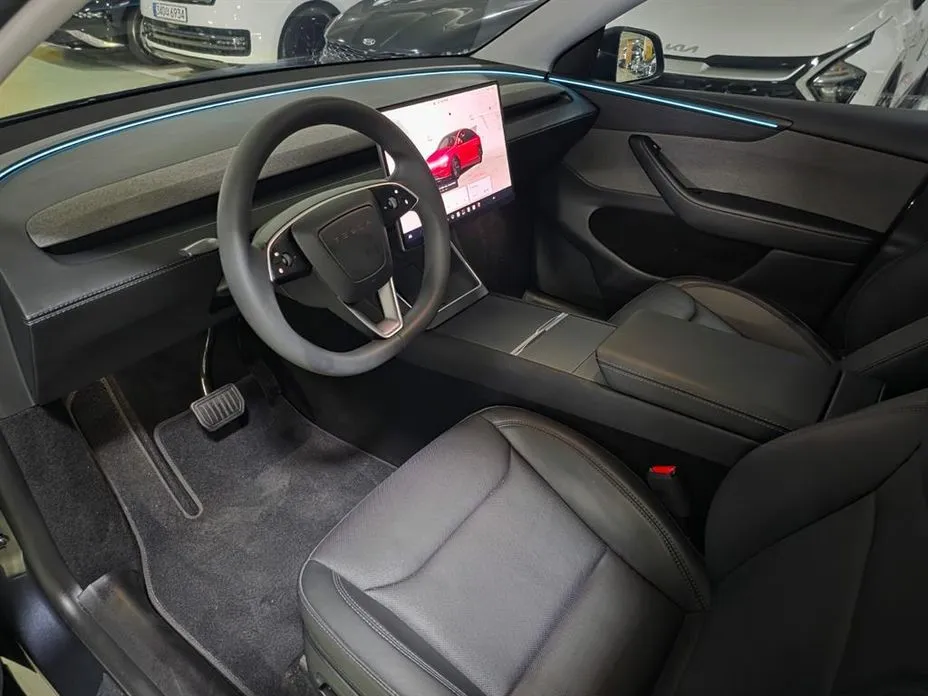 Tesla Model Y — фото 7