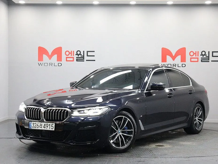 BMW 5-Series — фото 1