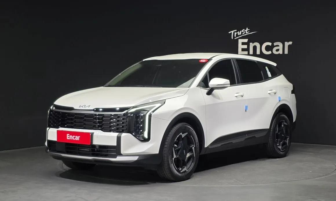 Kia Sportage — фото 1