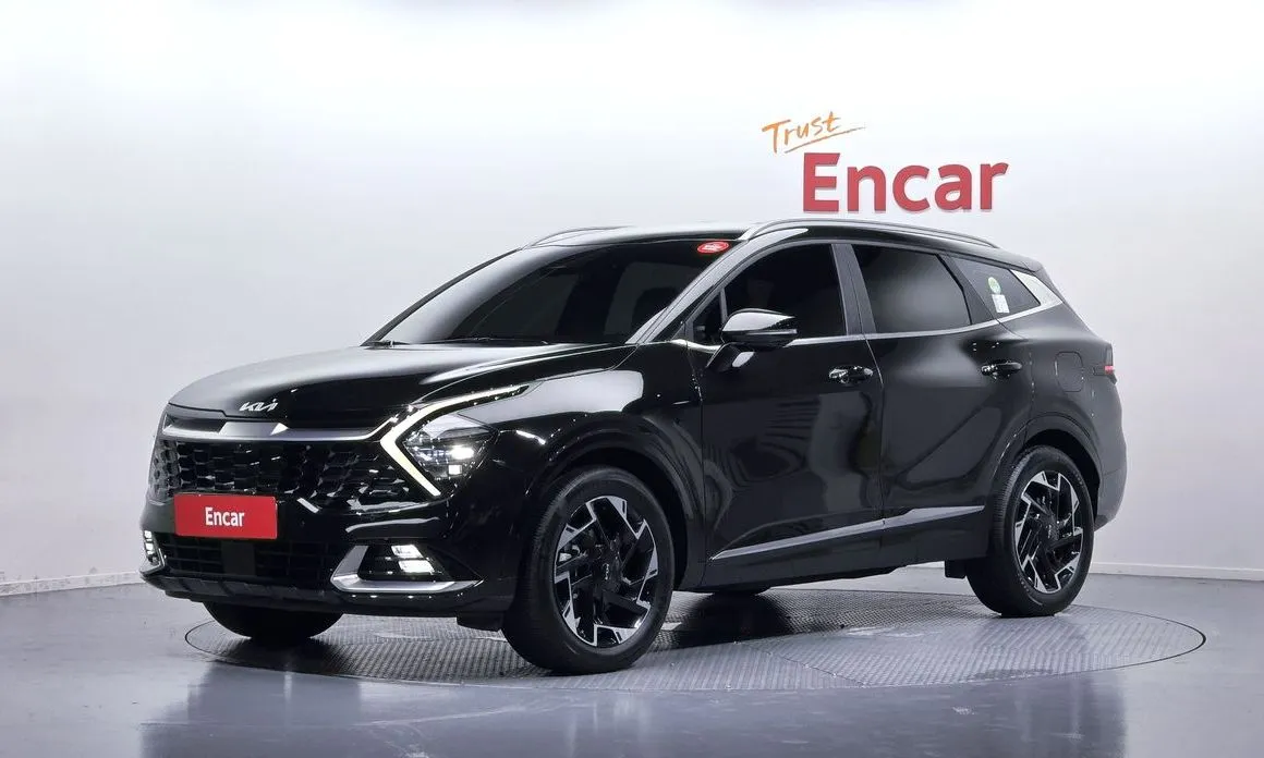 Kia Sportage — фото 1